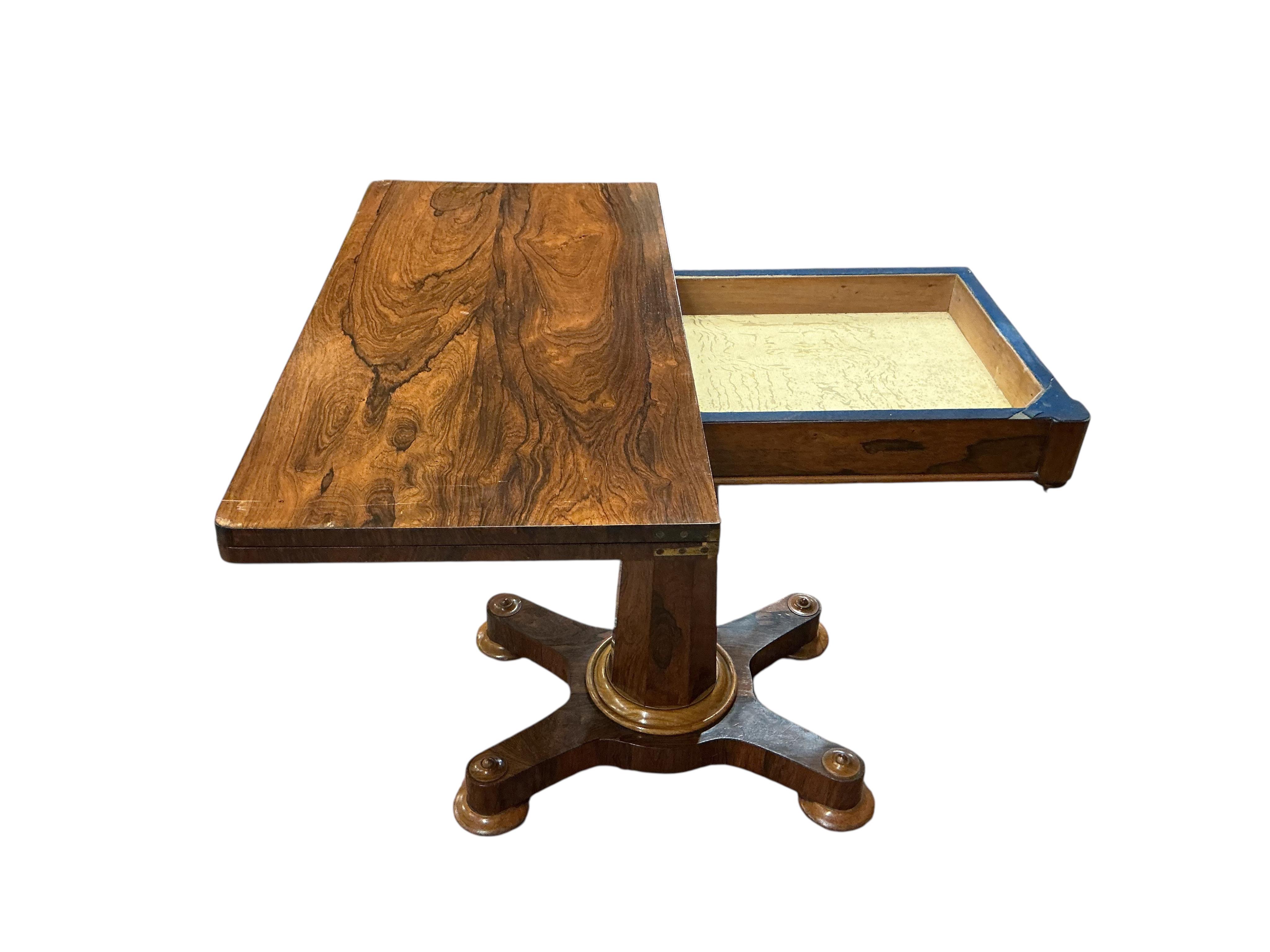 An early Victorian rectangular rosewood folding card table, width 91cm, depth 45cm, height 77cm